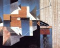 guitar on the table 1913 Juan Gris